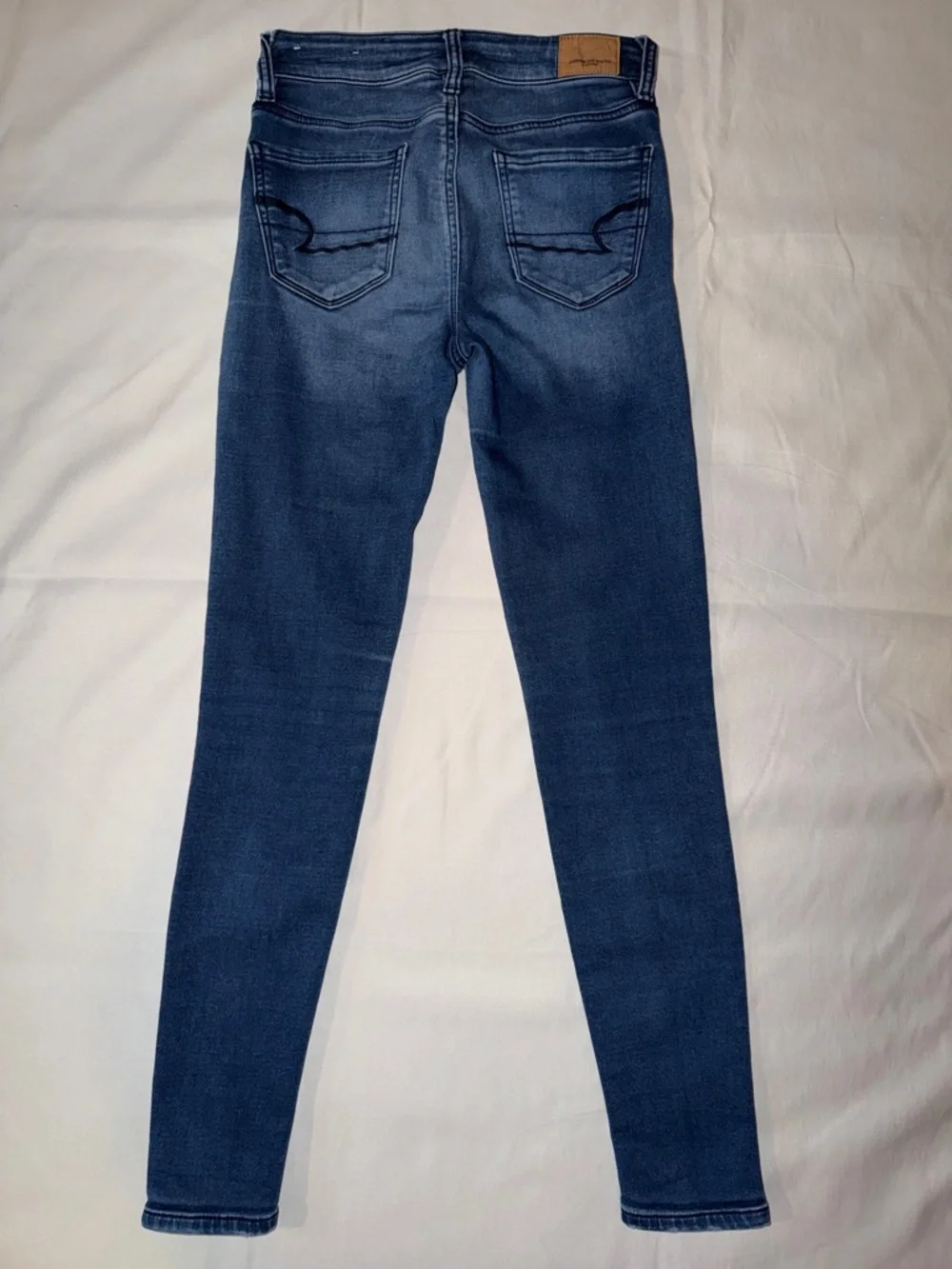 American Eagle Outfitters Blue Skinny Jeans with Back Pocket Wave Stitch - Picture 11 of 11